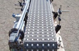 Объект: Конвейер с модульной лентой для пластиковых бутылей